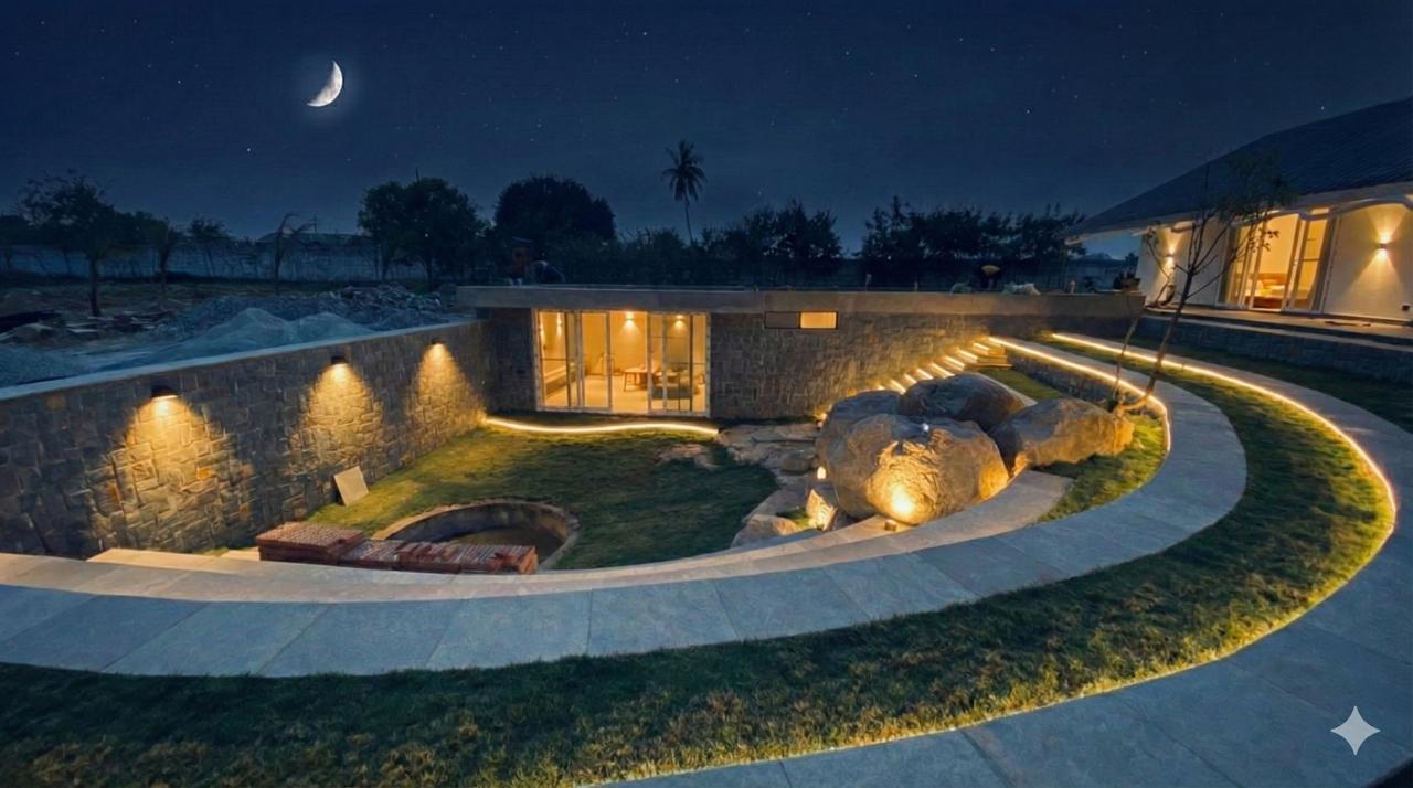 Stone courtyard lit up at night, ready for a gathering
